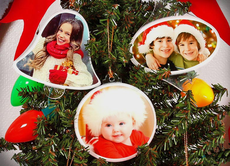 wood and acrylic ornaments on a christmas tree